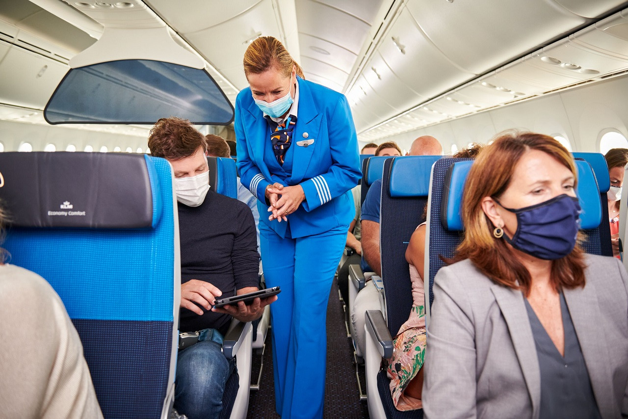Kabinpersonale og passasjerer - Fly - KLM